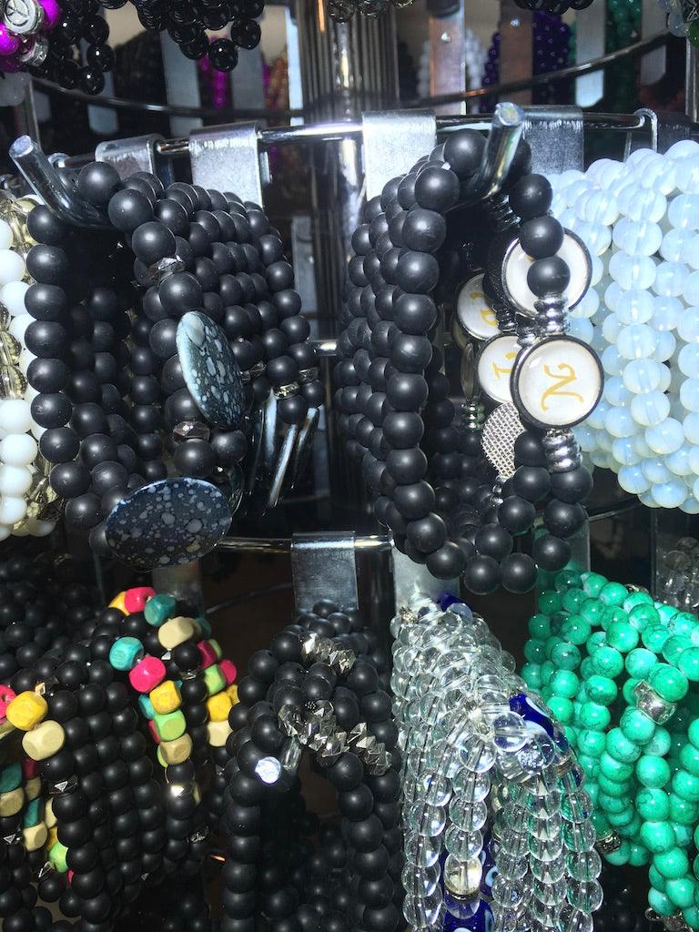 stone and glass bracelets with display 21